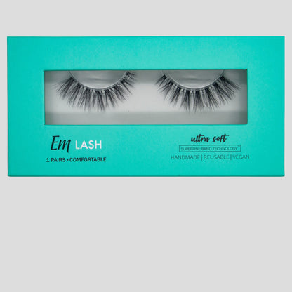 Em Lash ultra soft 1-pair false eyelashes in a bright turquoise packaging box with a clear window showing the lashes inside.