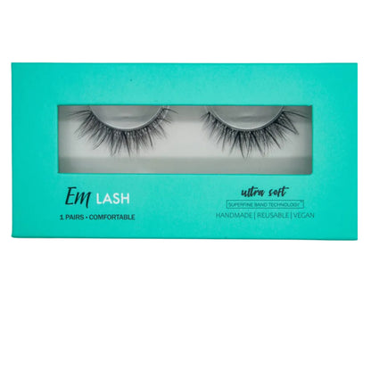Em Lash ultra soft false eyelashes in a turquoise window box packaging, shown against a solid gray background.