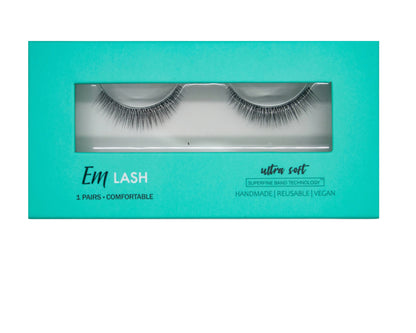 Em Lash ultra soft false eyelashes in a bright turquoise box with a clear window showing the lashes inside.