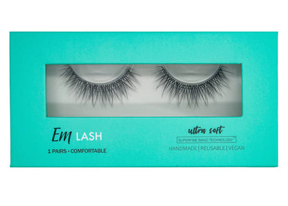 Em Lash Ultra Soft reusable false eyelashes in a bright turquoise packaging box with a clear window showing the lashes inside.