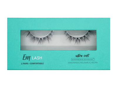 Em Lash ultra soft false eyelashes in a teal rectangular window box packaging, shown against a solid gray background.