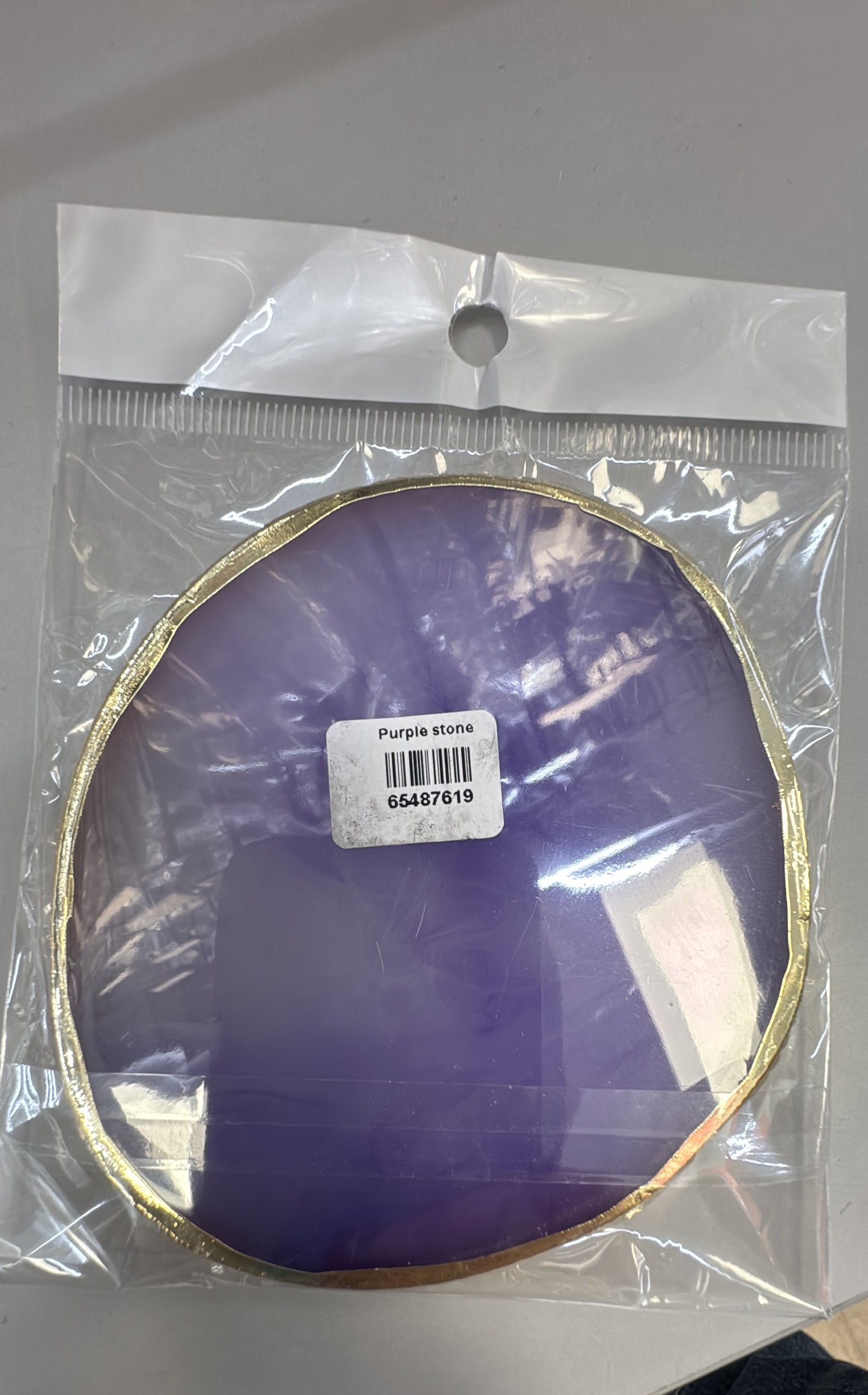 Purple round stone
