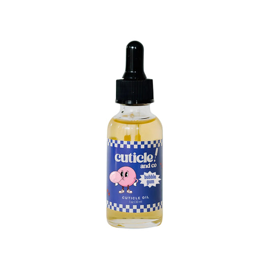 A bottle of cuticle oil with a black dropper cap and a blue label featuring a pink cartoon character, set against a solid light blue background.