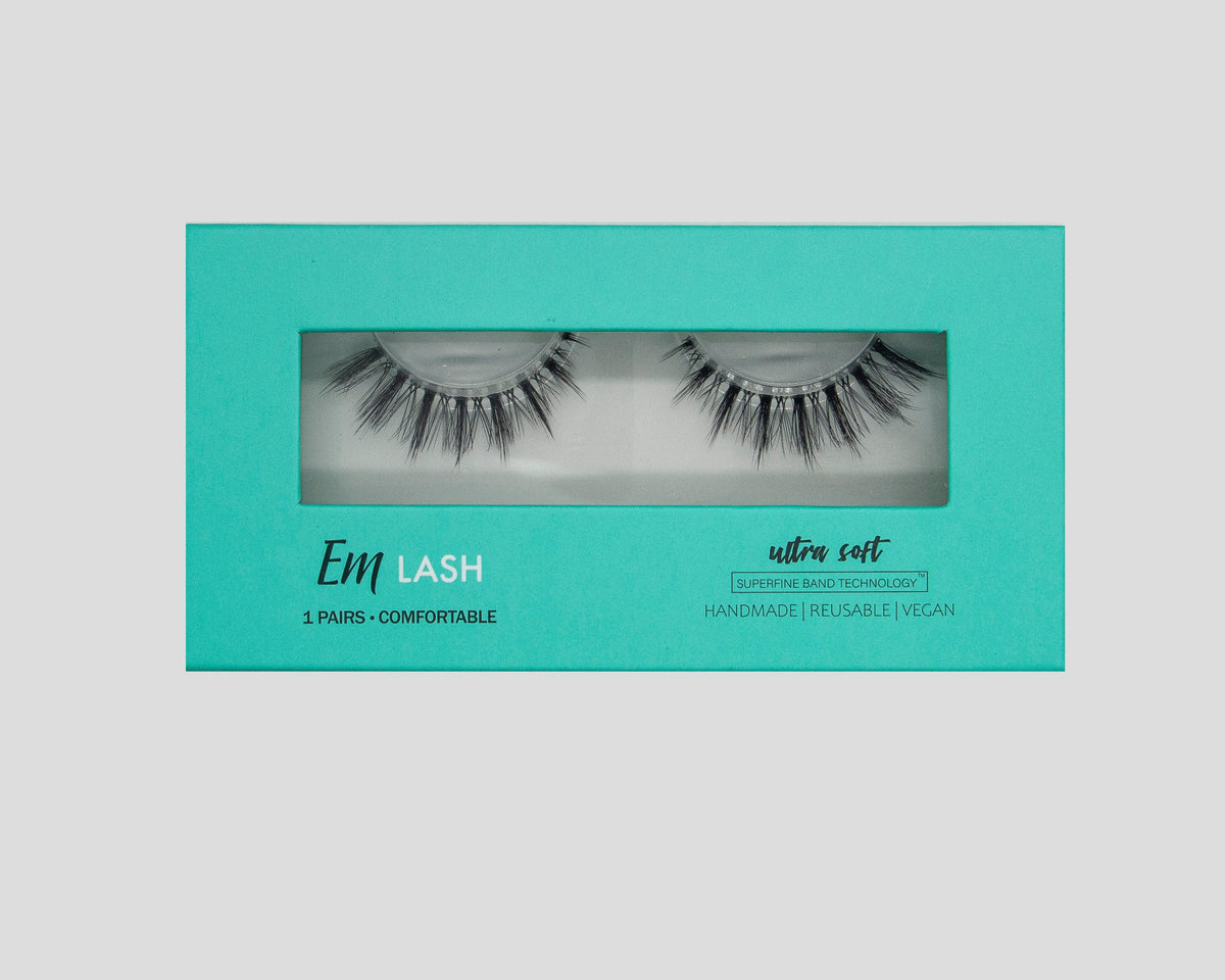 A pair of black false eyelashes in a turquoise rectangular box with a clear window. The box features the brand name 'Enrl LASH' and text reading 'ultra soft'.