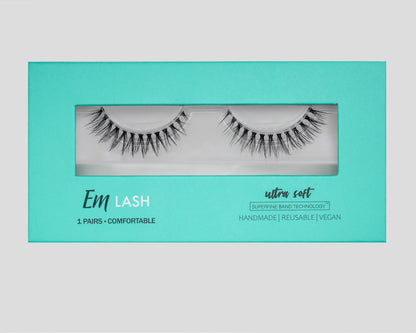 Em Lash reusable false eyelashes in a turquoise and white box, displayed against a neutral gray background.