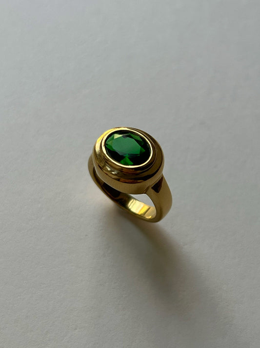 Green oval stone ring
