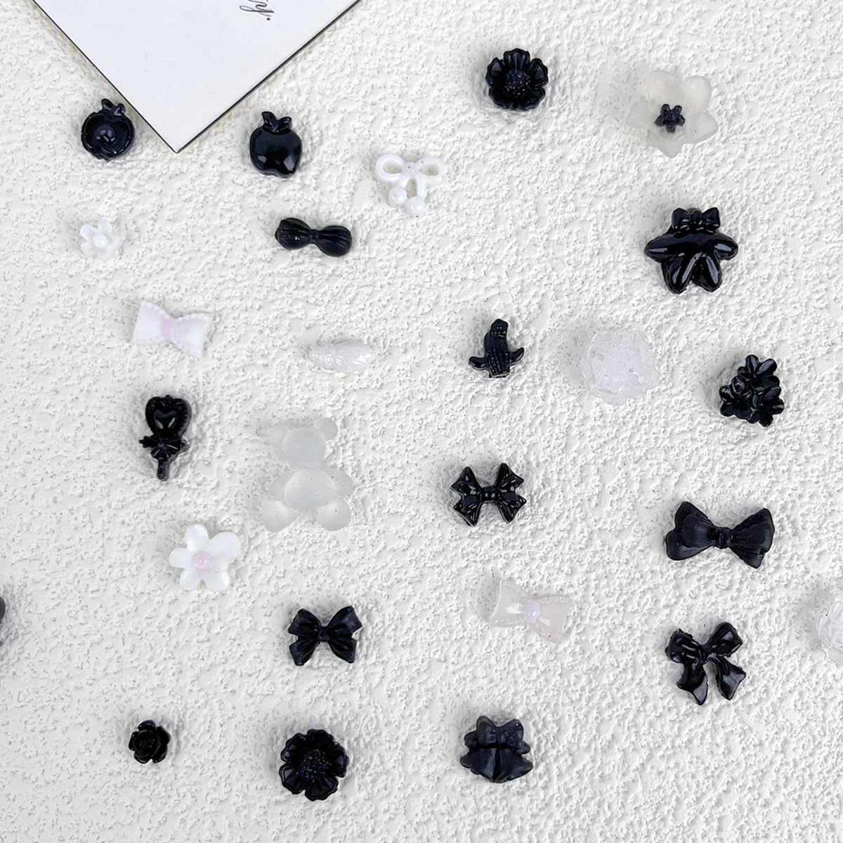 Small charms pack black flowers