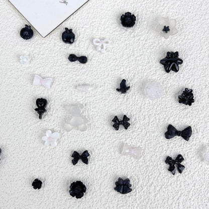 Small charms pack black flowers